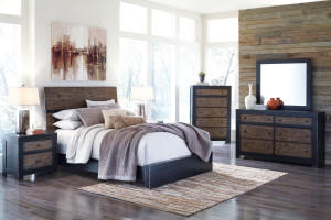Bedroom set with area rug layered