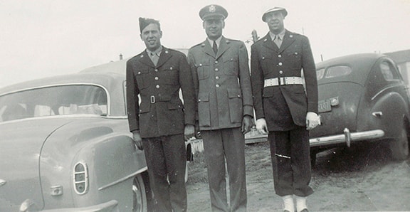 Jake and his brothers in uniform